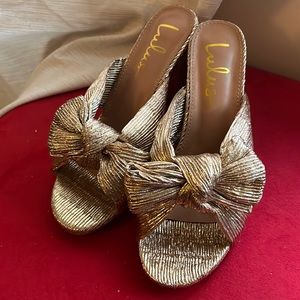 Never worn gold bow heeled sandals